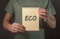 ECO word on paper in male hands, natural and organic life concept