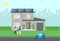 Ecohouse, a clean, smart city and a happy family. A man, woman and child are standing near their house with solar panels. There is