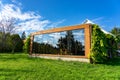 Ecologic building in the nature with huge windows in greeen