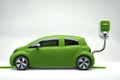 Ecologic car covered with green grass texture charging on a modern electric plug Royalty Free Stock Photo