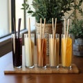 Ecological bamboo cocktail tubes for lemonades and drinks. Concept: Safe eco-friendly tableware without harm to the planet