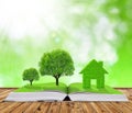 Ecological book with trees and house Royalty Free Stock Photo