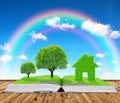 Ecological book with trees and house on table