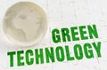 On white puzzles there is a glass globe and the inscription - Green Technology
