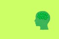 ecological design, green head with green brain on green background, copy space, creative art design Royalty Free Stock Photo