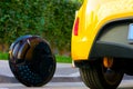 Ecological electric unicycle transport compare to gasoline diesel car Royalty Free Stock Photo