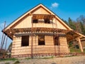 Ecological family house onstruction. Lining the house of spruce boards Royalty Free Stock Photo
