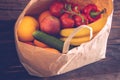 Ecological paper bag full of fruits and vegetables Royalty Free Stock Photo