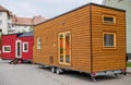 Ecological small wooden houses on wheels at local fair.