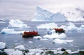 Ecological tourists in inflatable Zodiac boat in Paradise Harbor, Antarctica