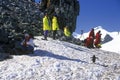 Ecological tourists observing Chinstrap penguins (Pygoscelis antarctica) on Half Moon Island, Bransfield Strait, Antarctica Royalty Free Stock Photo