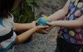 Ecology children sharing and support save the world Royalty Free Stock Photo