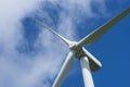 Ecology concept: Blue sky, white clouds and wind turbine. Wind generator for electricity, alternative energy source. Royalty Free Stock Photo