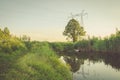 Ecology concept: sewer pours out waste to the river/water gushing from the sewer to the river Royalty Free Stock Photo