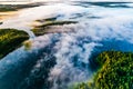 Ecology concept. Thick fog over blue lakes at dawn. Aerial landscape Royalty Free Stock Photo