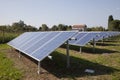 Ecology electric energy farm with solar panel battery in green f