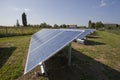 Ecology electric energy farm with solar panel battery in green f