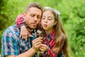 Ecology. Happy family day. little girl and happy man dad. earth day. spring village country. family summer farm Royalty Free Stock Photo