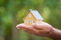 Ecology house in hands Royalty Free Stock Photo