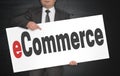 ECommerce poster is held by businessman Royalty Free Stock Photo