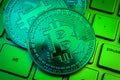 Ecommerce using cryptocurrency, blockchain technology and digital currency concept with close up on bitcoin sitting on a computer