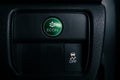 Econ button on dashboard of modern car