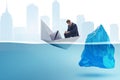 The economic crisis concept with businessman in sinking paper boat Royalty Free Stock Photo