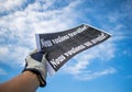 Economic crisis. Factory workers are losing their jobs. A worker holds a banner Royalty Free Stock Photo