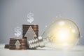 Economic and investment growth in the United States of America. Light bulb as idea with stacks of coins and up arrows. Royalty Free Stock Photo