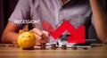 Economic recession concept, crisis. Money with red arrow down. Decreased funds and money. Fall of economy, capital reduction. Lowe Royalty Free Stock Photo