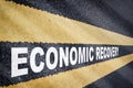Economic recovery word on asphalt road with marking lines for giving directions Royalty Free Stock Photo