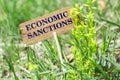Economic sanctions wooden sign