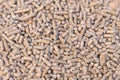 Wood pellets for wood stove close up background Royalty Free Stock Photo