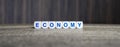 Economy boggle word cubes on dark background