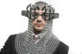 economy, businessman with medieval executioner in metal and silver glasses. concept of protection of savings and money