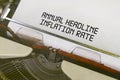 The text is printed on a typewriter - Annual headline inflation rate