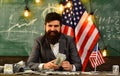 Economy and finance. Patriotism and freedom. Income planning of budget increase policy. Bearded man with dollar money Royalty Free Stock Photo