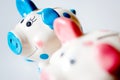 Economy and finance - savings in a money box - two pink and blue Royalty Free Stock Photo