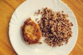 Economy food. rissole and buckwheat groats