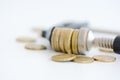 Economy pressure concept with stack of coins in a cramp Royalty Free Stock Photo