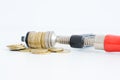Economy pressure concept with stack of coins in a cramp Royalty Free Stock Photo