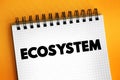 Ecosystem - consists of all the organisms and the physical environment with which they interact, text concept on notepad Royalty Free Stock Photo