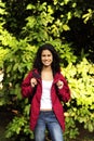 Ecotourism: woman hiking in the forest Royalty Free Stock Photo