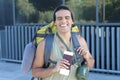 Ecstatic backpacker smiling with eyes closed