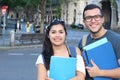 Ecstatic couple of ethnic international students abroad