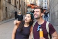 Ecstatic couple showing surprise during a vacation