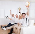 Ecstatic family celebrating a win Royalty Free Stock Photo