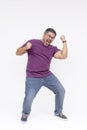 An ecstatic man celebrating by dancing around, overwhelmed with joy. Full body shot, isolated on a white background