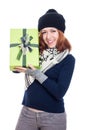 Ecstatic winter woman with present