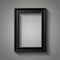 Ectangular picture frame with a simple elegant design is set against a gray Royalty Free Stock Photo